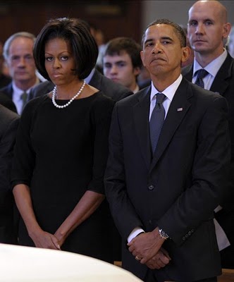 Michelle Obama: The Funeral Frowning Wench